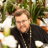 Логотип телеграм канала @athoniada — Священник Роман Колесников