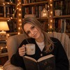 Логотип телеграм канала @booktravelss — по страницам с Аней 🐾