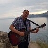 Логотип телеграм канала @budniulichnogomuzicanta — Будни уличного музыканта.Николай Ковров