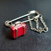 Логотип телеграм канала @bulavka_na_karte — БУЛАВОЧКА С ЧЕМОДАНОМ
