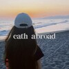 Логотип телеграм канала @cath_abroad — cath abroad 👩🏽‍🎓🎧