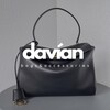 Логотип телеграм канала @davianshopping — davían | Сумки и аксессуары