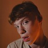 Логотип телеграм канала @dolnatin — рыжий чел (Сëма Кропотов)