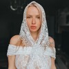 Логотип телеграм канала @frolovamagicspace — Лара Богова, идущая с Богом