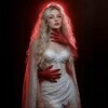 Логотип телеграм канала @juinred — Жуля в красном углу