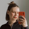 Логотип телеграм канала @katyakukis — барышня с каре