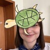 Логотип телеграм канала @katyavfm — черепашка из финашки🐢