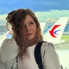 Логотип телеграм канала @lerriweb_travel — С кудрями по миру