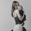 Логотип телеграм канала @lizaroshh — молочко Тёма