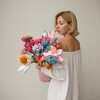 Логотип телеграм канала @pani_flowers — Вязаные цветы и букеты PANI