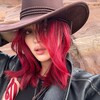 Логотип телеграм канала @rallllllina — девочка красные волосы