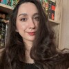 Логотип телеграм канала @riza_books — рина потерялась в библиотеке 📚