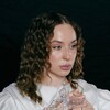 Логотип телеграм канала @romanovskayamusic — ROMANOVSKAYA