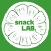 Логотип телеграм -каналу snack_lab — Snack LAB. Сиродавлені олії💚 вітграс🌱 снеки🌰