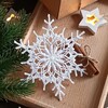Логотип телеграм канала @snowflakes_crocheted — Вязаные снежинки @s.lana.knits