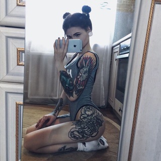 Логотип телеграм канала @tattoos_world — Весь в Татуировках