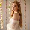 Логотип телеграм канала @tinamindgarden — 🌸