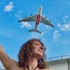 Логотип телеграм канала @travelella — с Эллой без границ 🌎